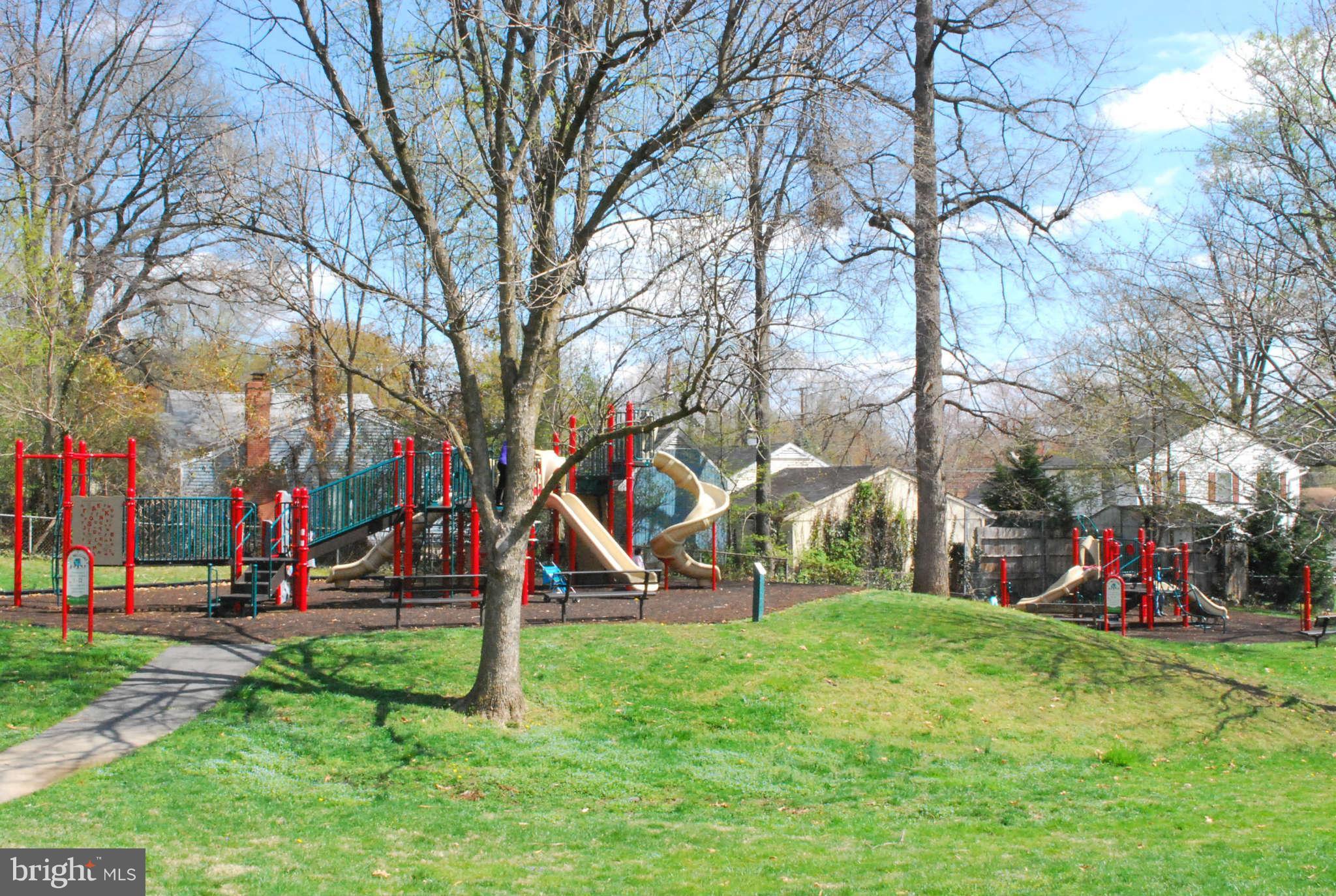 1015 Veirs Mill Road Rockville, MD 20851 - Photo 50 of 57 a view of a park with swings and slides