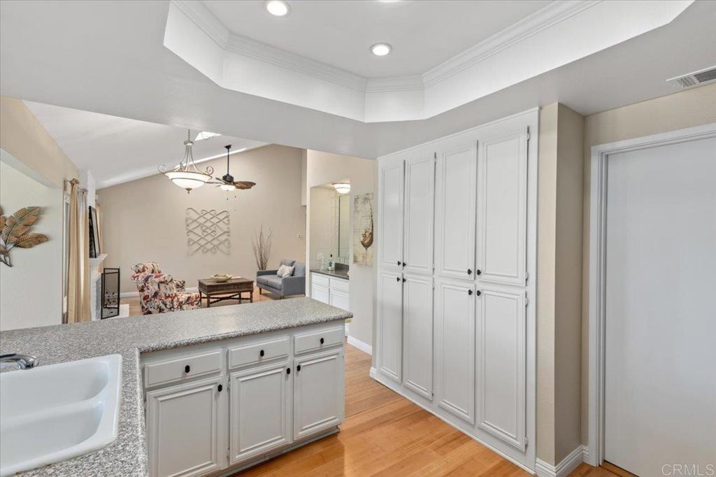 1277 La Casa Drive San Marcos, CA 92078 - Photo 16 of 29 a bathroom with a sink double vanity granite tub and shower