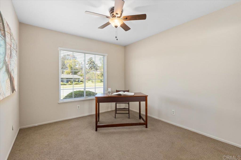 1277 La Casa Drive San Marcos, CA 92078 - Photo 24 of 29 a work room with chandelier fan and windows