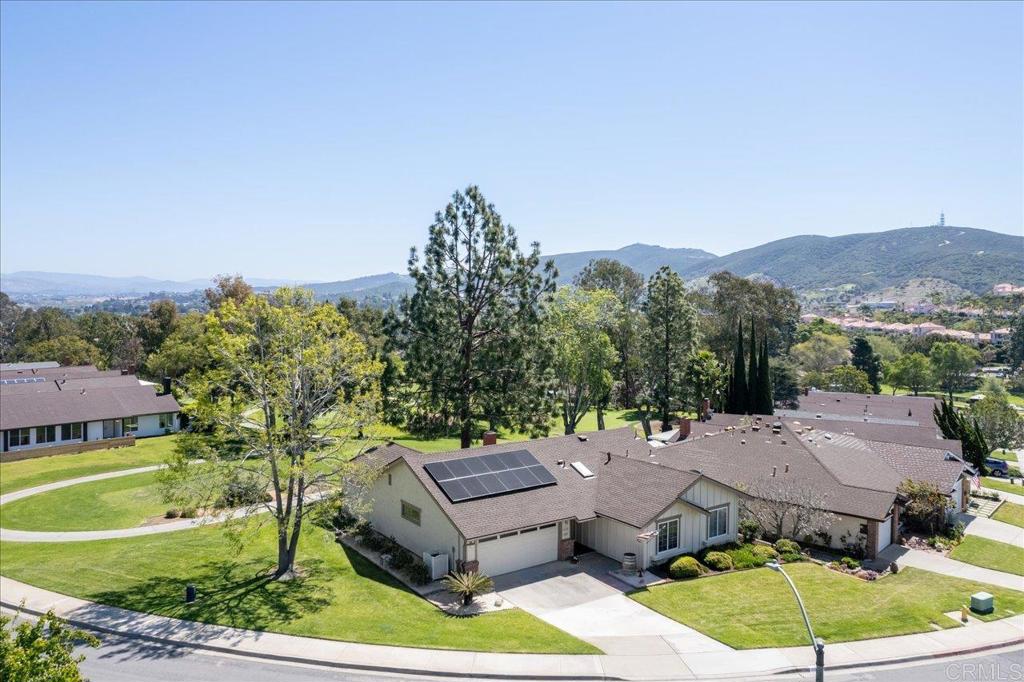 1277 La Casa Drive San Marcos, CA 92078 - Photo 28 of 29 a view of a house with a yard and sitting area