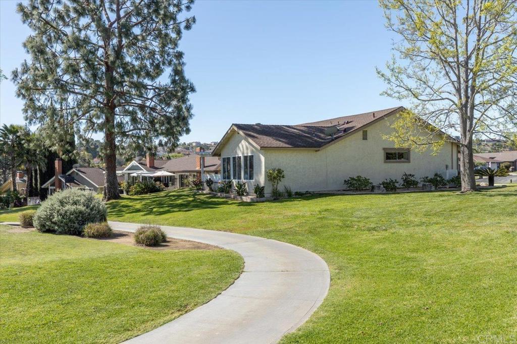1277 La Casa Drive San Marcos, CA 92078 - Photo 29 of 29 a backyard of a house with lots of green space