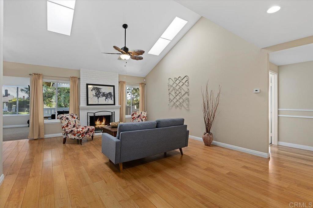1277 La Casa Drive San Marcos, CA 92078 - Photo 7 of 29 a living room with furniture and a wooden floor