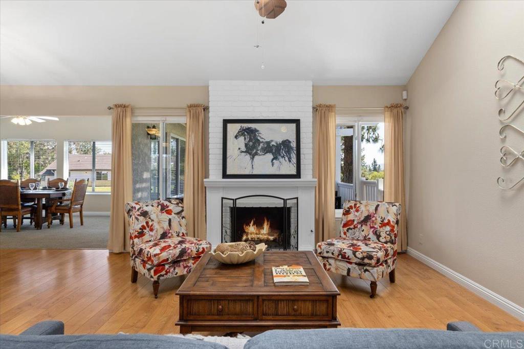 1277 La Casa Drive San Marcos, CA 92078 - Photo 8 of 29 a living room with furniture and a fireplace