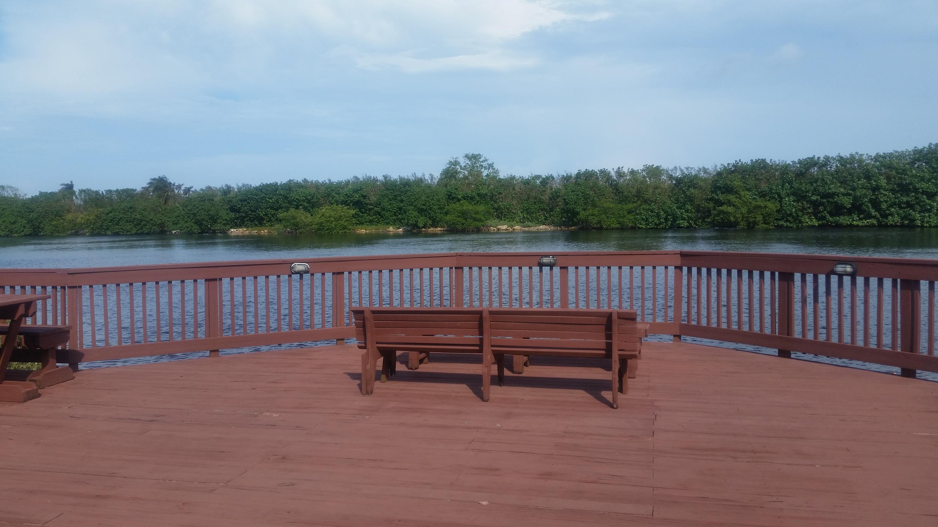 1004 Kokomo Key Lane Delray Beach, FL 33483 - Photo 16 of 21 a view of a bench in the roof deck