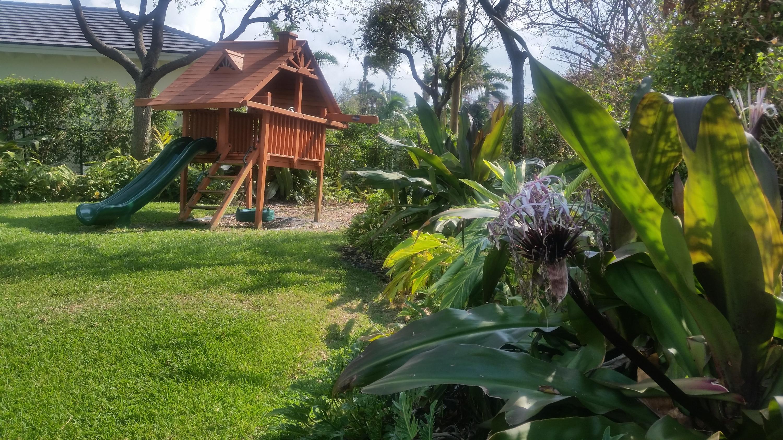 1004 Kokomo Key Lane Delray Beach, FL 33483 - Photo 20 of 21 a view of a house with a park