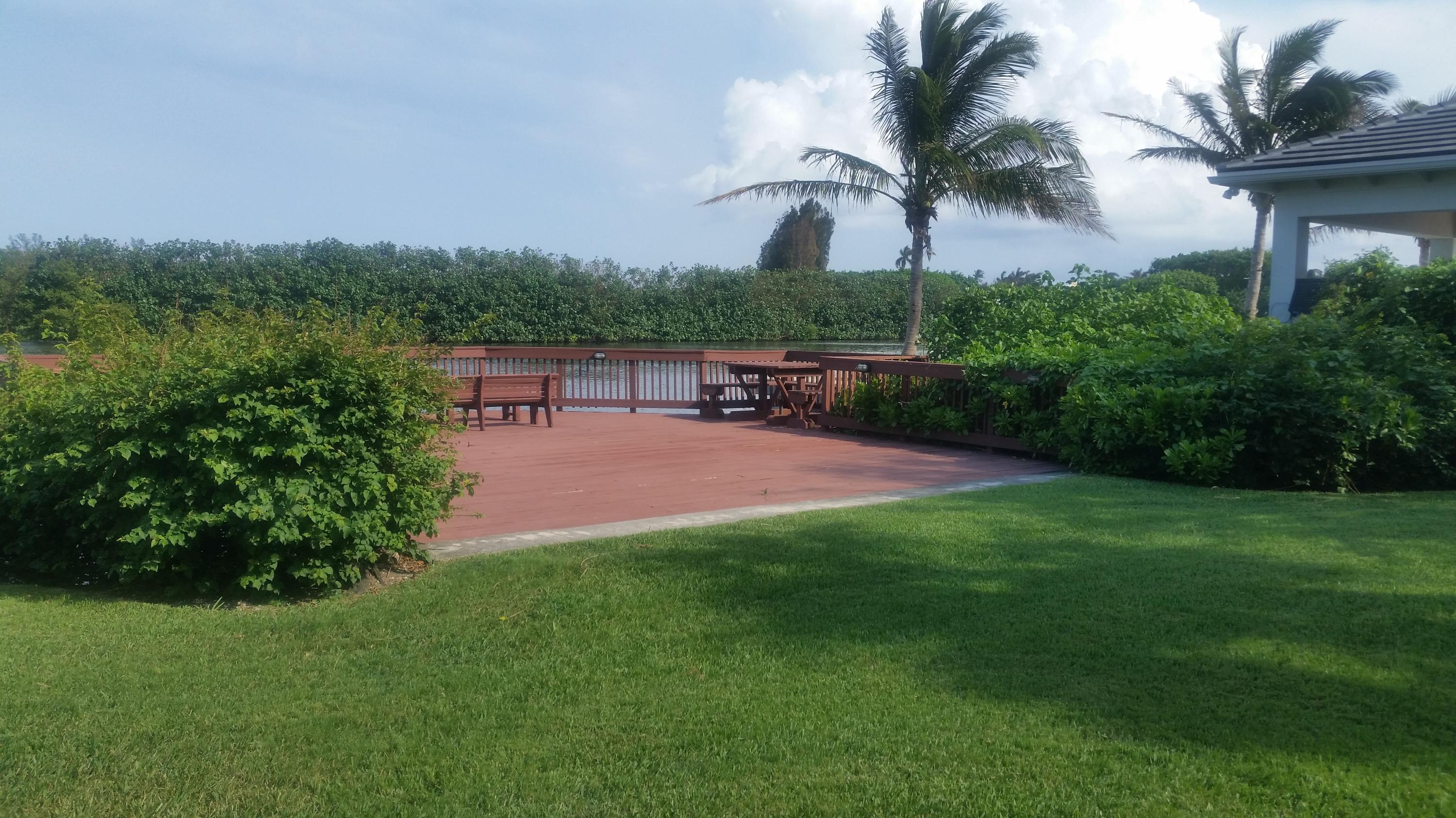 1004 Kokomo Key Lane Delray Beach, FL 33483 - Photo 21 of 21 a view of a backyard
