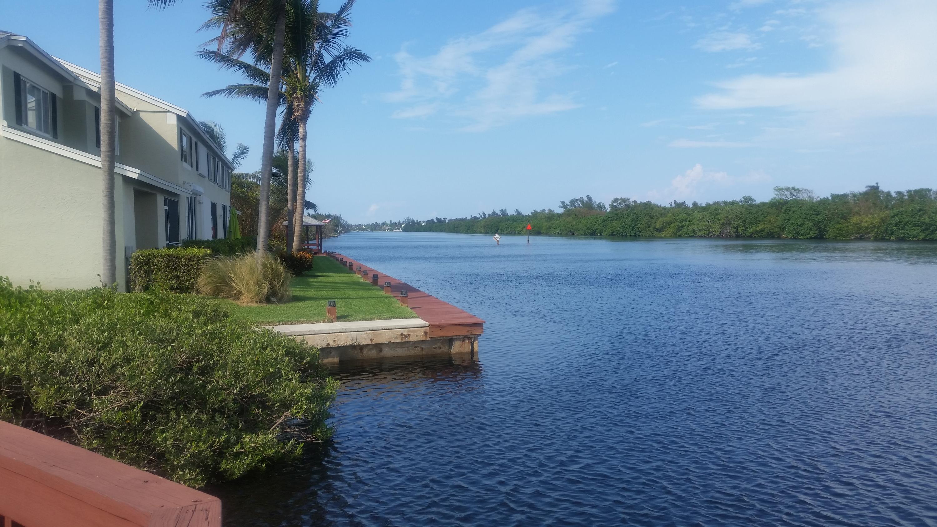 1004 Kokomo Key Lane Delray Beach, FL 33483 - Photo 3 of 21 a view of a yard with an outdoor space