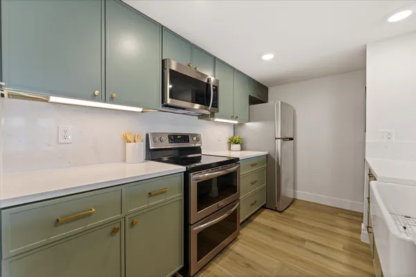 a utility room with washer and dryer