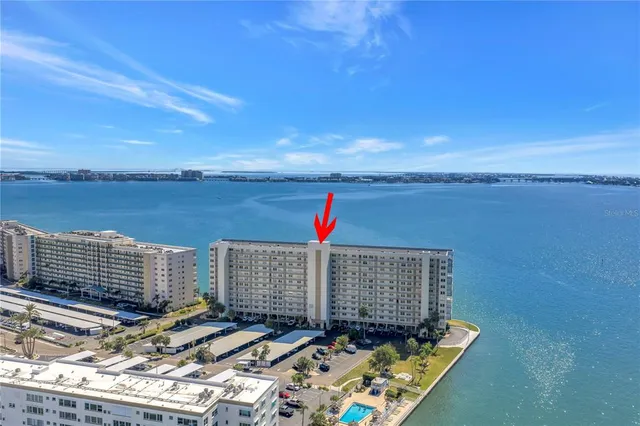 a view of a balcony with an ocean