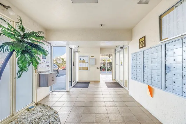 an empty room with sliding glass door