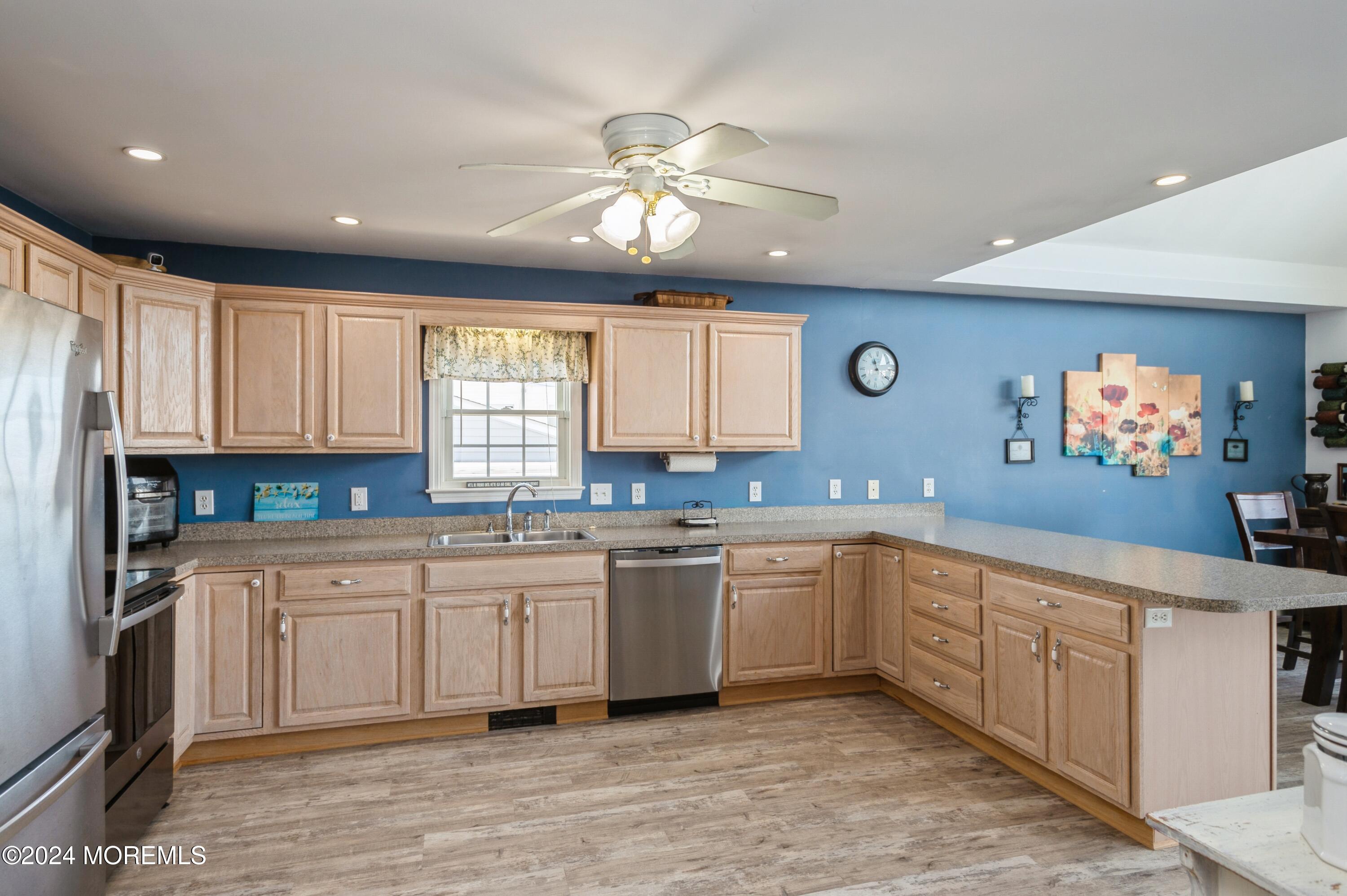 115 Curlew Road Tuckerton, NJ 08087 - Photo 12 of 36 a kitchen with a sink cabinets and window