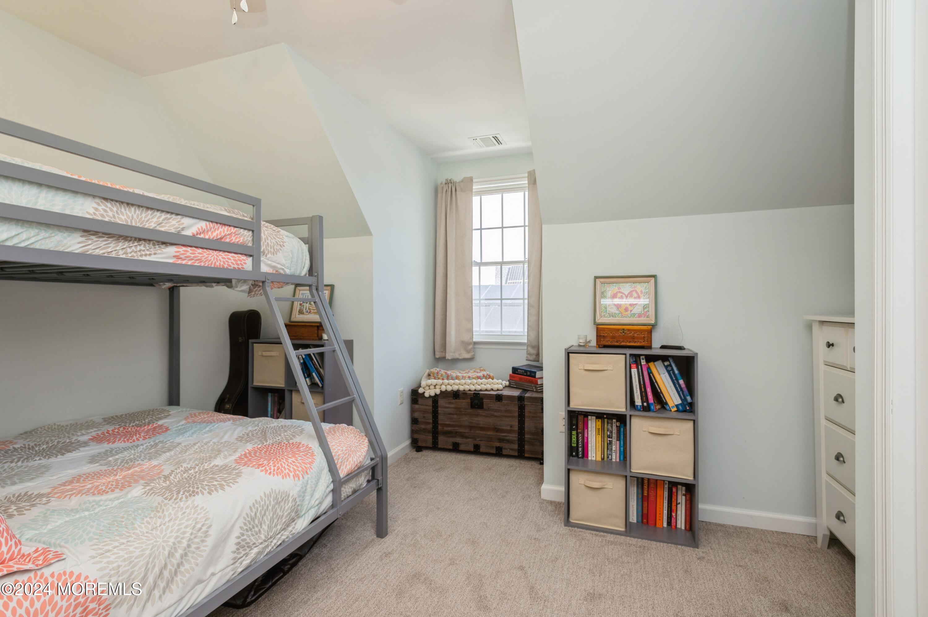 115 Curlew Road Tuckerton, NJ 08087 - Photo 17 of 36 a bedroom with a bed and a window
