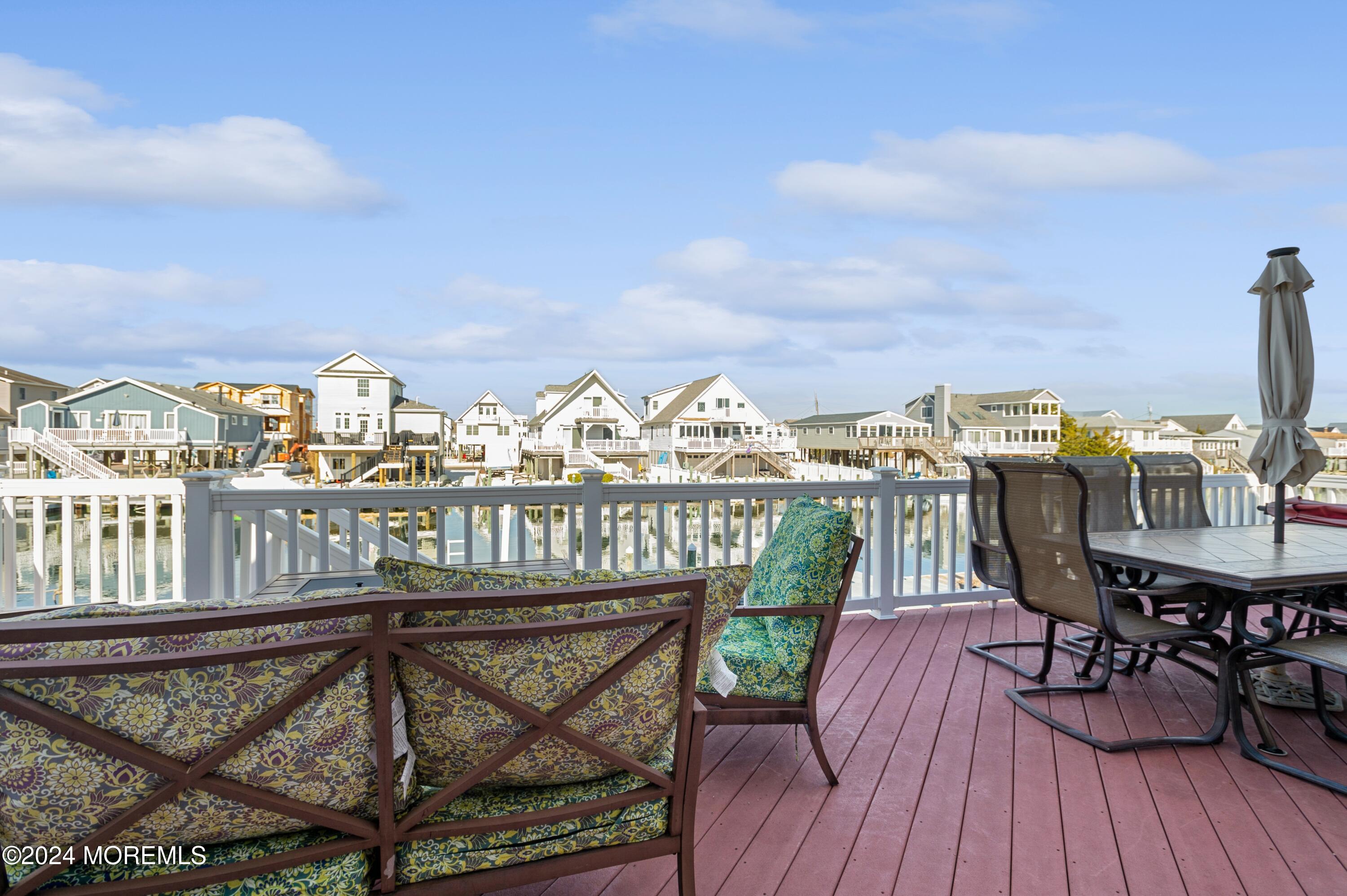 115 Curlew Road Tuckerton, NJ 08087 - Photo 20 of 36 a view of a balcony with chairs