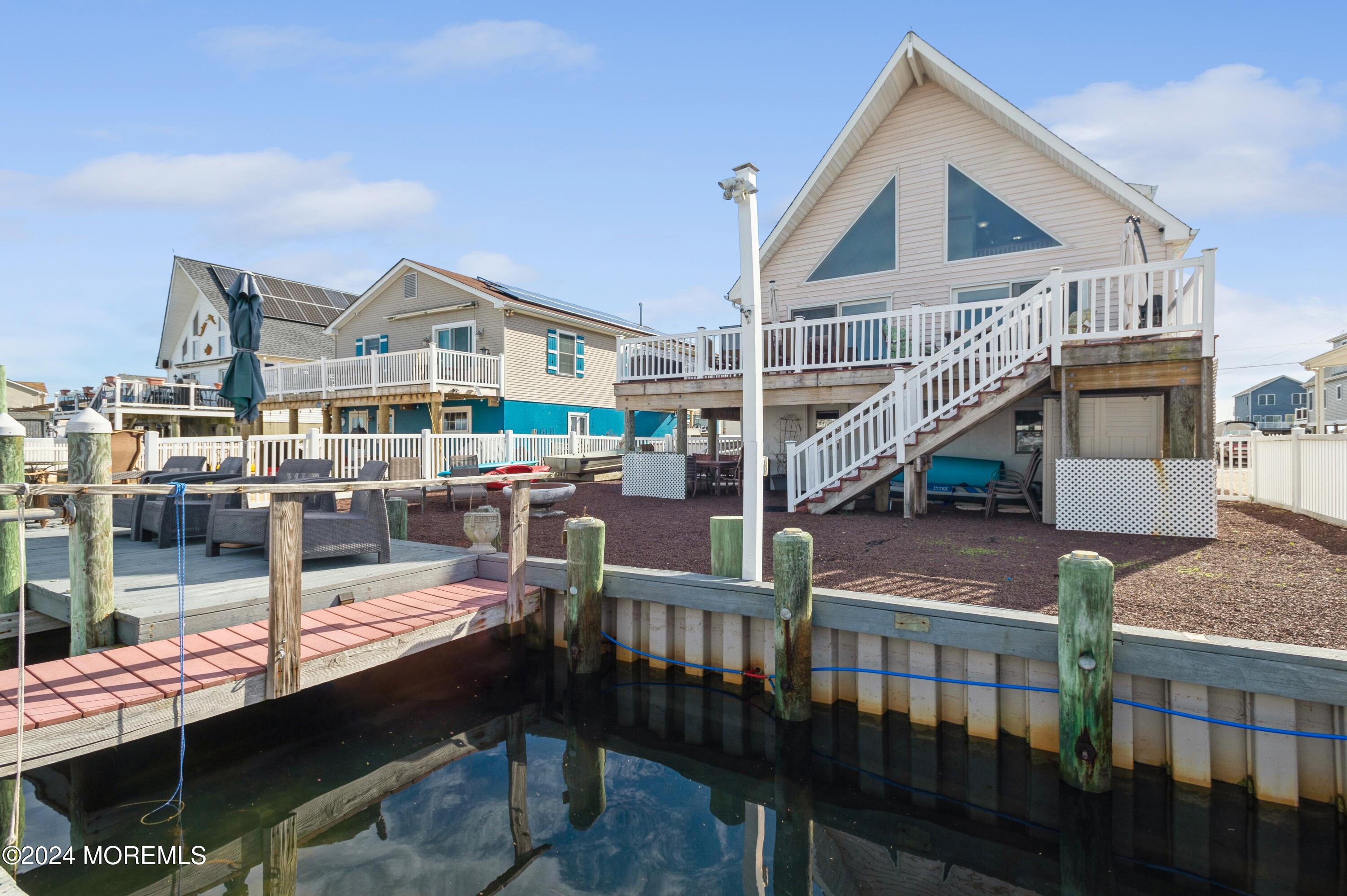 115 Curlew Road Tuckerton, NJ 08087 - Photo 22 of 36 a front view of a house with street