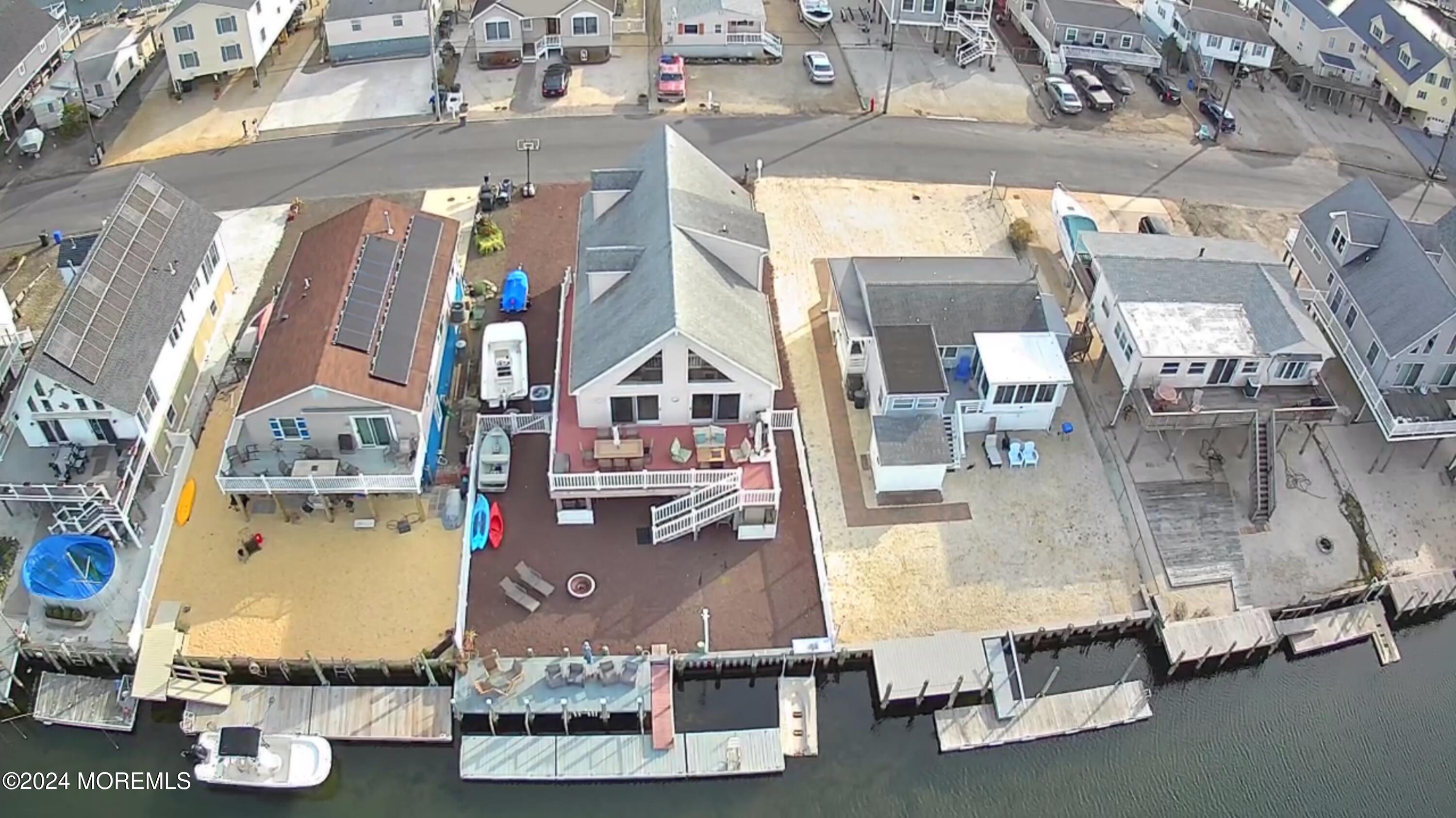 115 Curlew Road Tuckerton, NJ 08087 - Photo 33 of 36 an aerial view of residential houses with outdoor space and parking