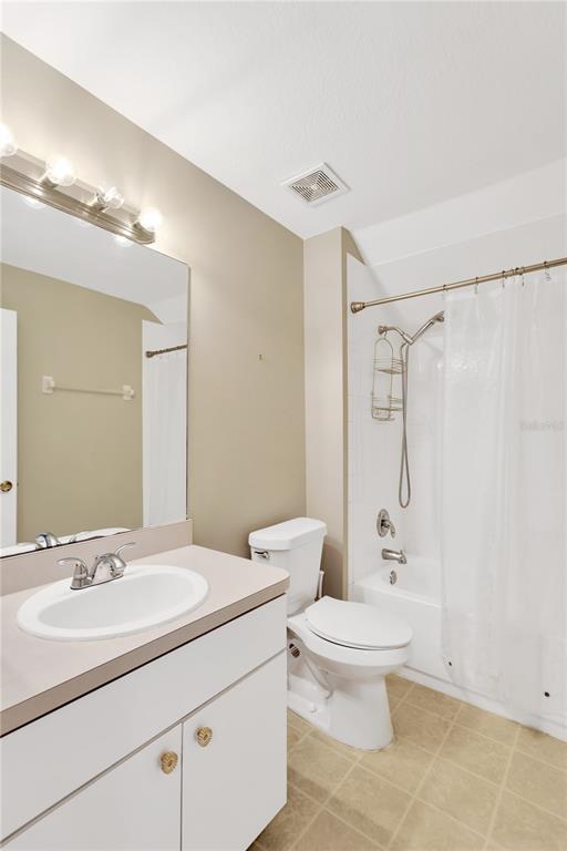 10814 Newbridge Drive Riverview, FL 33579 - Photo 23 of 44 a bathroom with a sink a toilet and shower