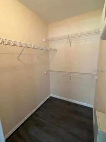 a view of an empty walk in closet