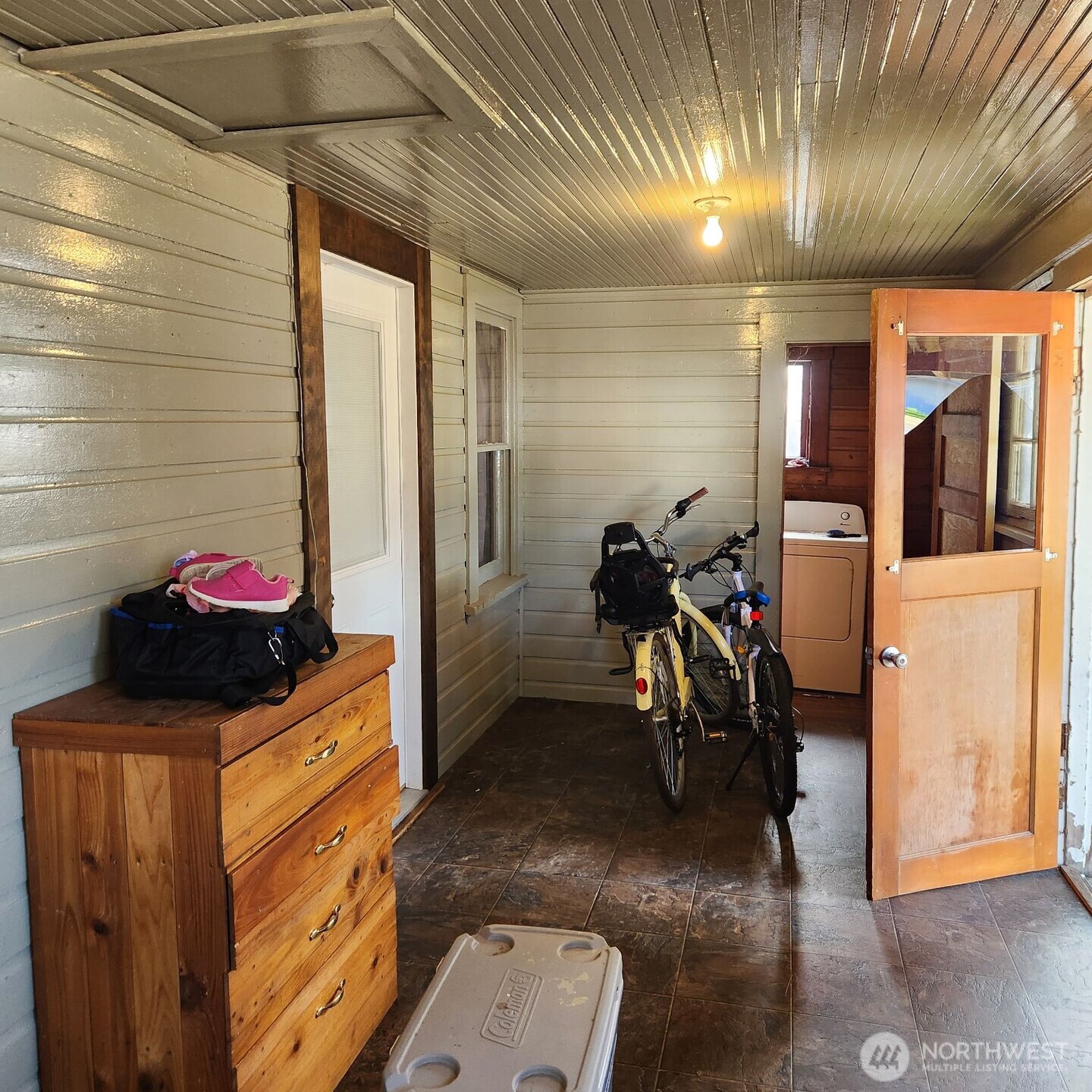 252 4th Street Morton, WA 98356 - Photo 12 of 17 a hallway with a stove and a refrigerator