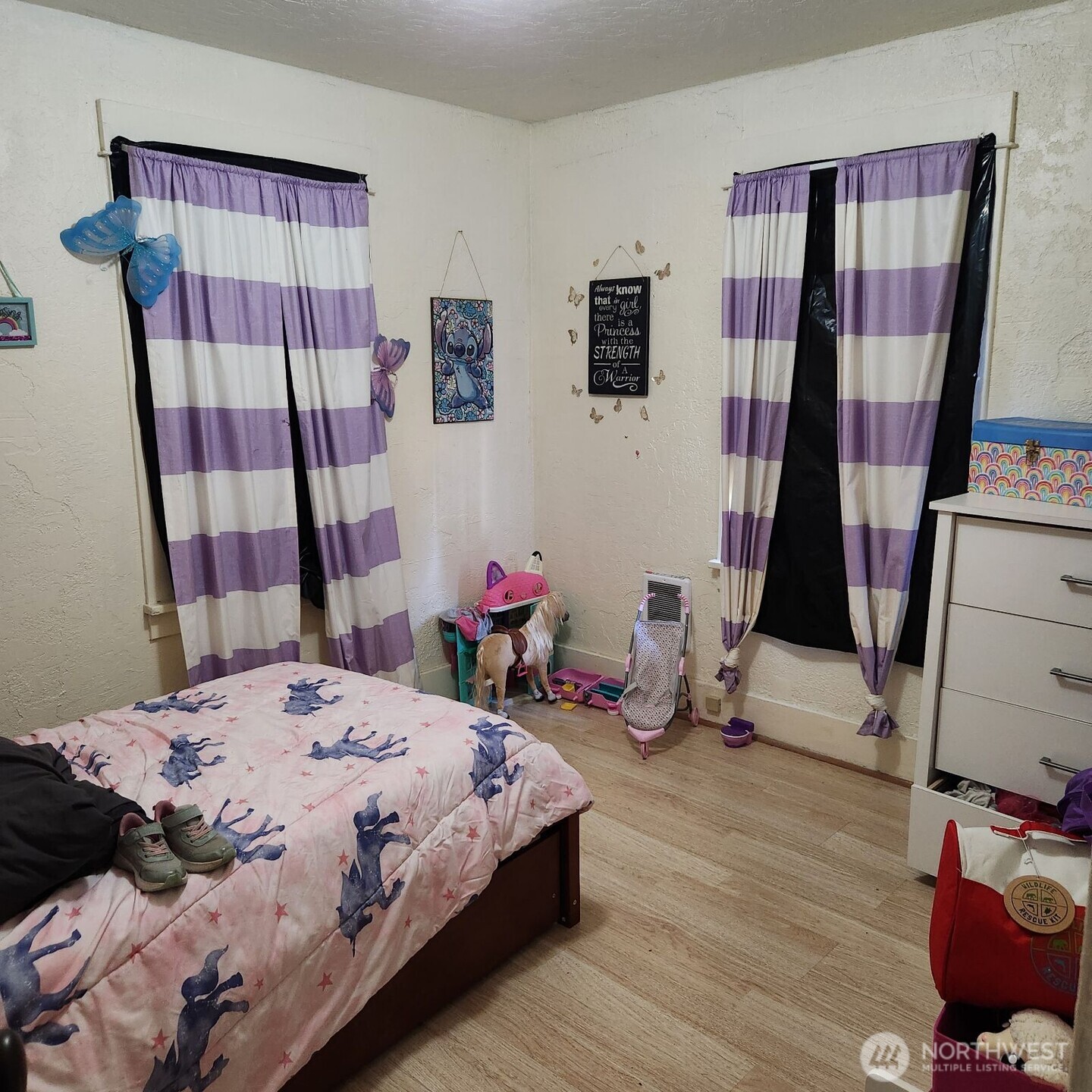 252 4th Street Morton, WA 98356 - Photo 9 of 17 a bedroom with a bed and a mirror