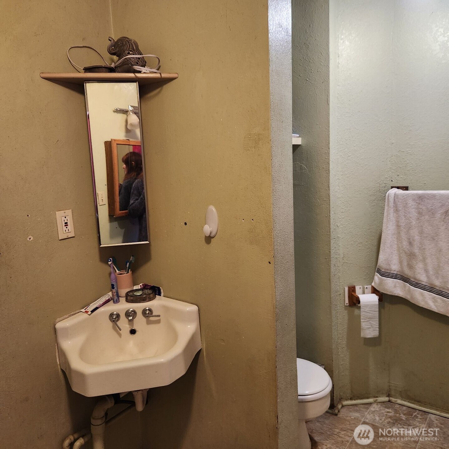 252 4th Street Morton, WA 98356 - Photo 10 of 17 a bathroom with a sink toilet and mirror