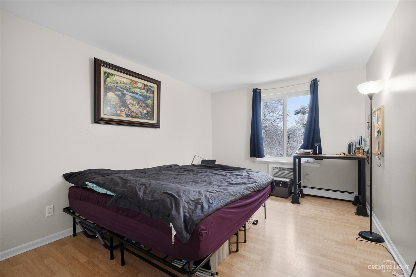 1900 Light Road, Unit 204 Oswego, IL 60543 - Photo 9 of 15 a bedroom with a bed and a dresser