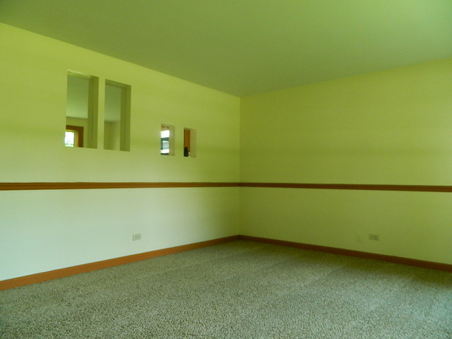 1416 Hainesville Road Round Lake Beach, IL 60073 - Photo 3 of 7 a view of a room