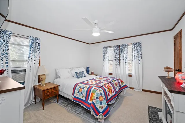 a room with furniture and a flat screen tv