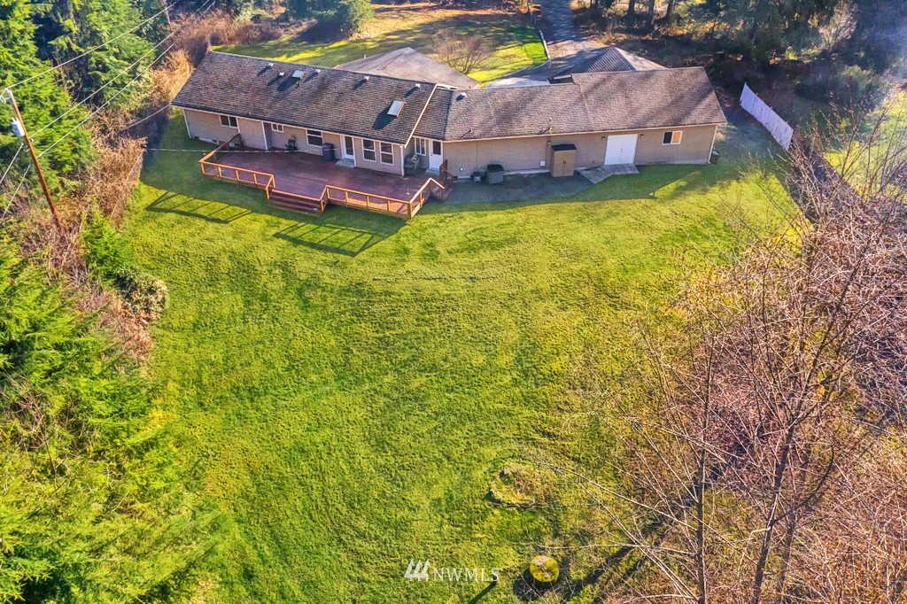 101 North Lake Roesiger Road Snohomish, WA 98290 - Photo 3 of 39 a view of a house with a big yard