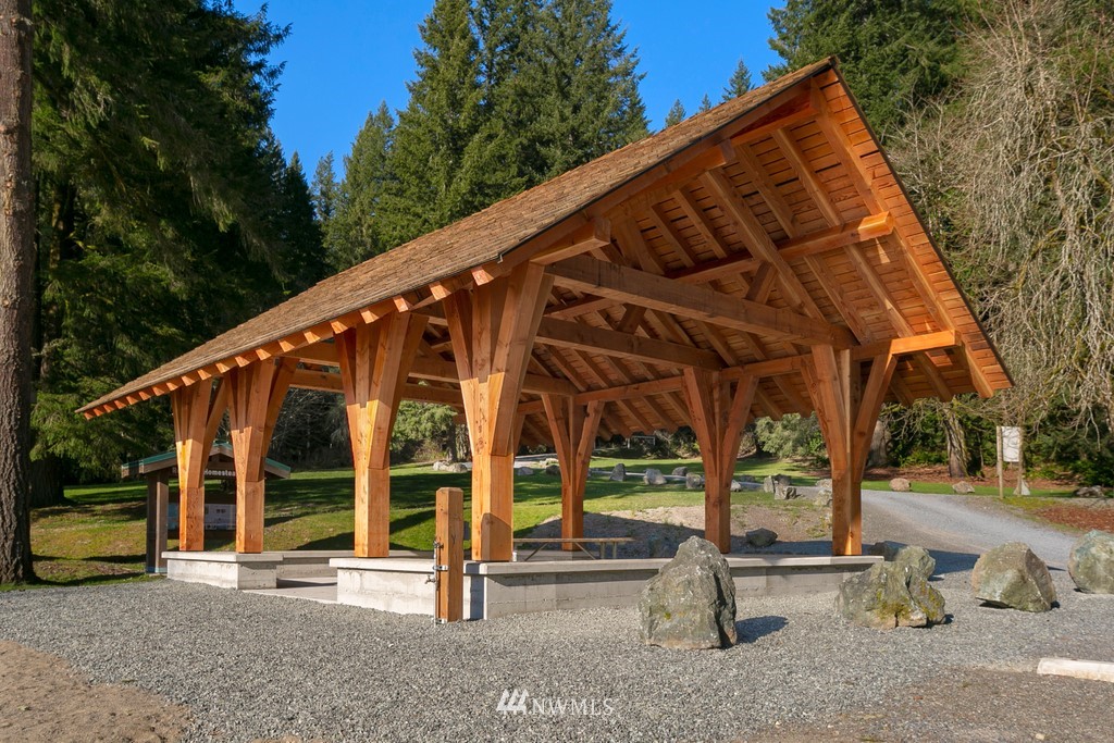 101 North Lake Roesiger Road Snohomish, WA 98290 - Photo 38 of 39 a view of tall trees with a bench and floor
