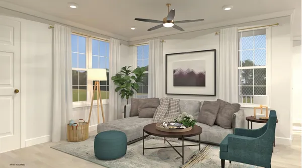 a living room with furniture and a large window