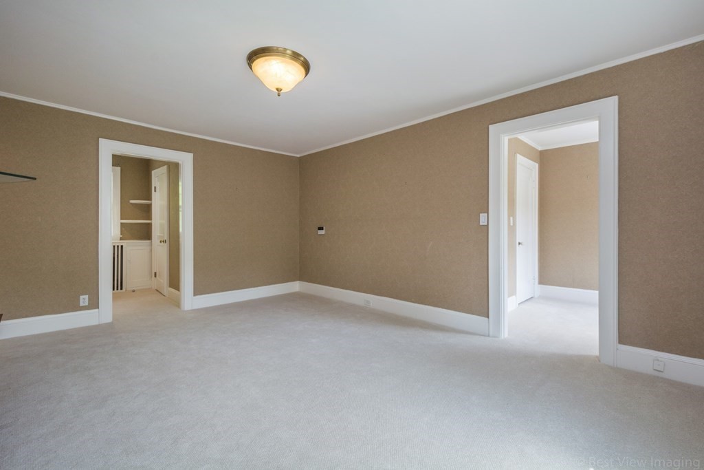 10 Chapin Road Newton, MA 02459 - Photo 20 of 35 a view of an empty room with a window