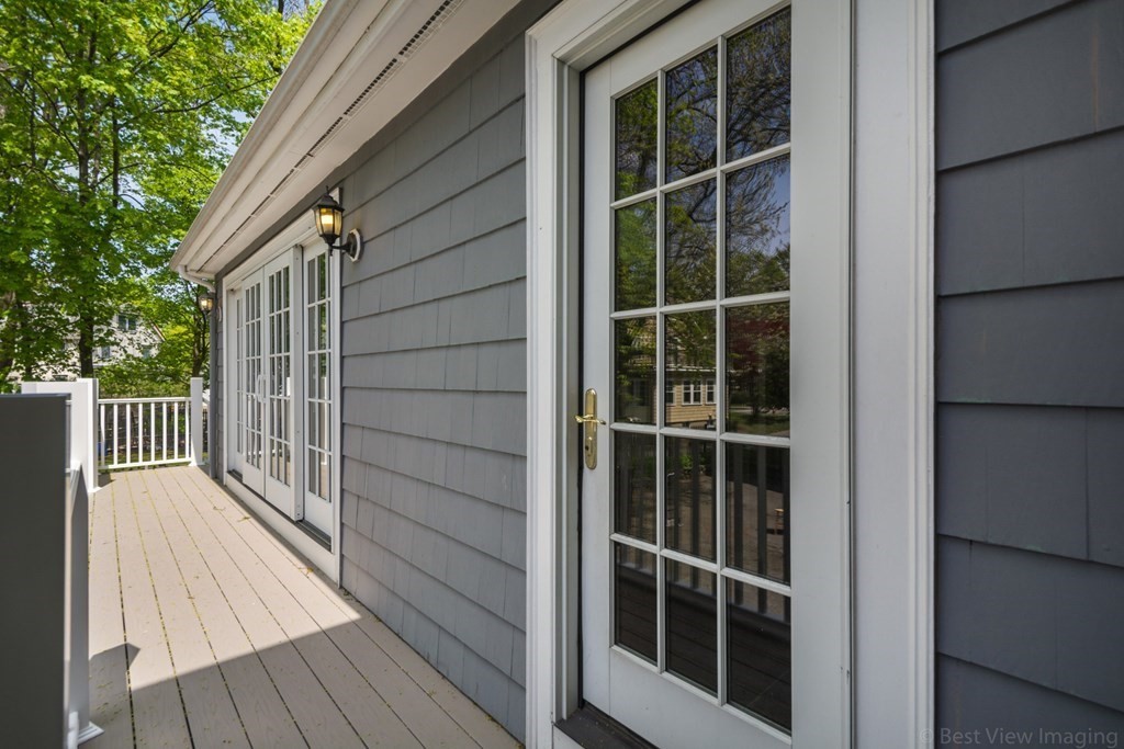10 Chapin Road Newton, MA 02459 - Photo 29 of 35 a view of balcony with wooden floor and fence