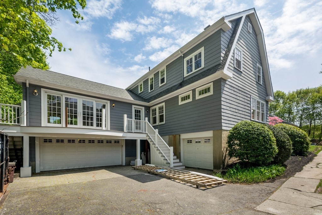 10 Chapin Road Newton, MA 02459 - Photo 31 of 35 a front view of a house with a garage
