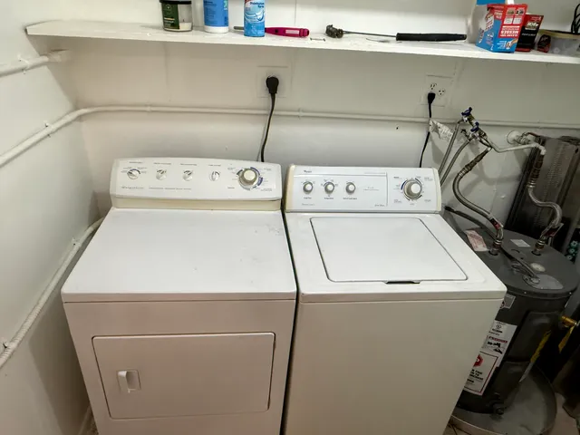 a utility room with dryer and washer