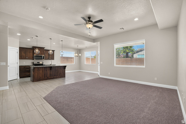 11 East 640 South Ivins, UT 84738 - Photo 9 of 44 Open-concept living area with integrated kitchen