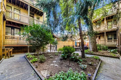 a backyard of a house with lots of green space