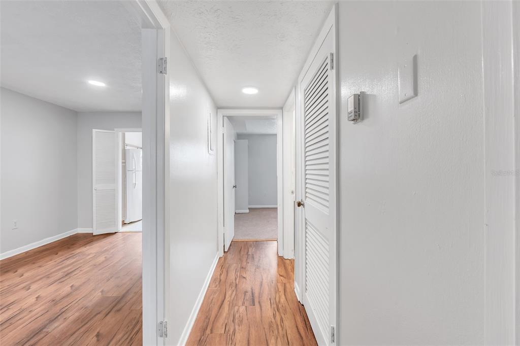 4212 Lake Underhill Road, Unit A Orlando, FL 32803 - Photo 15 of 35 a view of a hallway with wooden floor