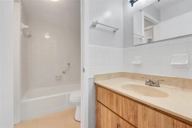 a bathroom with a sink and a bathtub