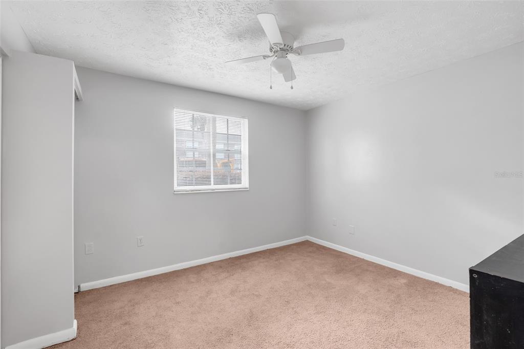 4212 Lake Underhill Road, Unit A Orlando, FL 32803 - Photo 23 of 35 an empty room with a window