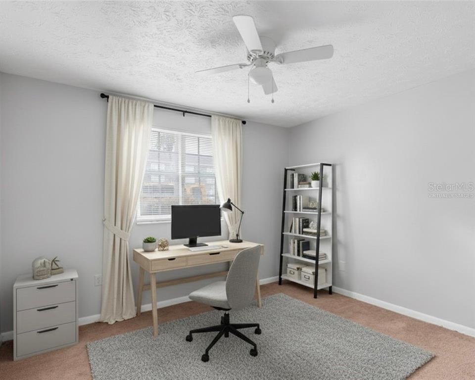 4212 Lake Underhill Road, Unit A Orlando, FL 32803 - Photo 24 of 35 a view of a workspace with furniture and a window