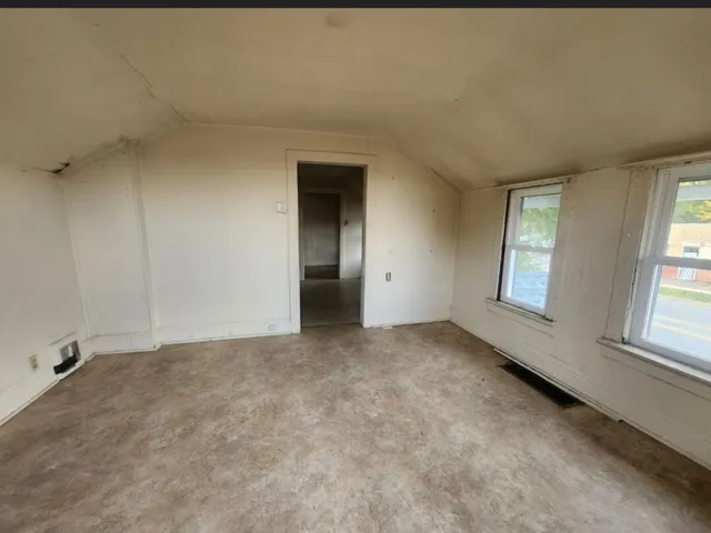 an empty room with a window