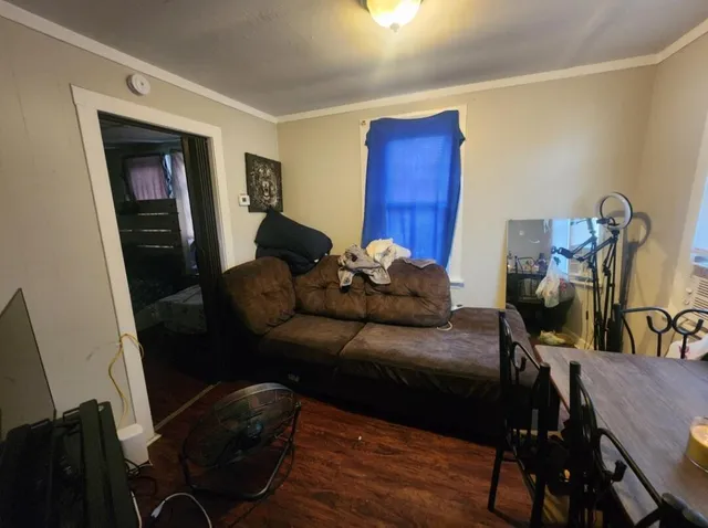 a kitchen with a stove and a refrigerator