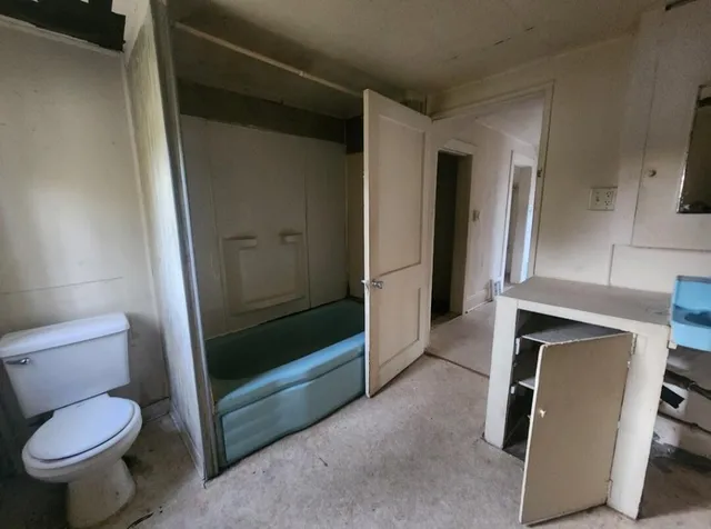 a view of empty room with windows