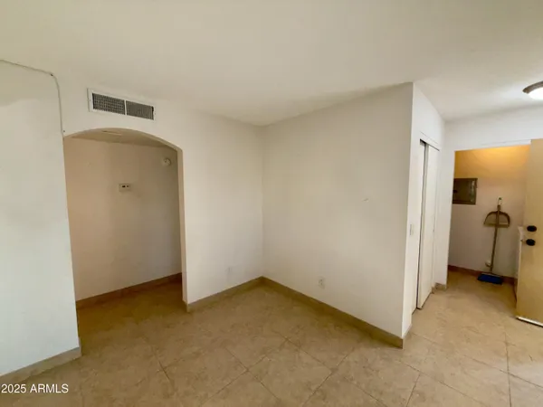 an empty room with windows