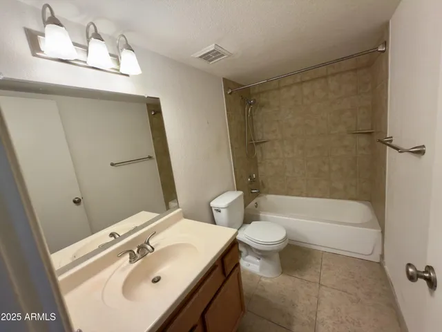 a view of livingroom with furniture and windows