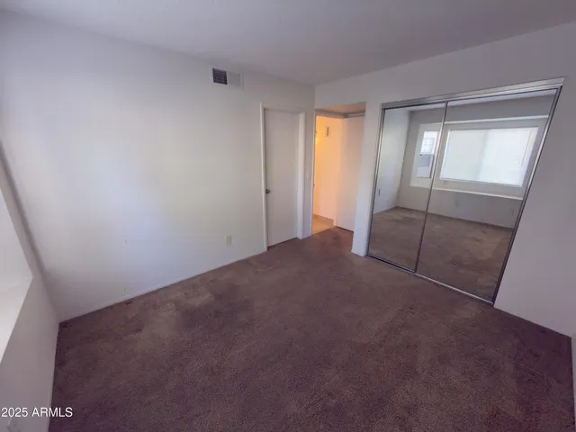 an empty room with closet