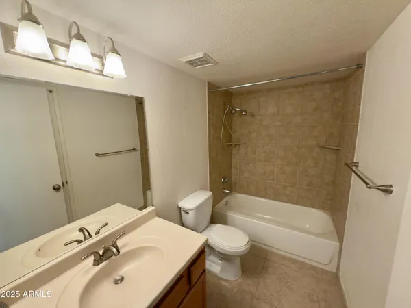 a bathroom with a bath tub
