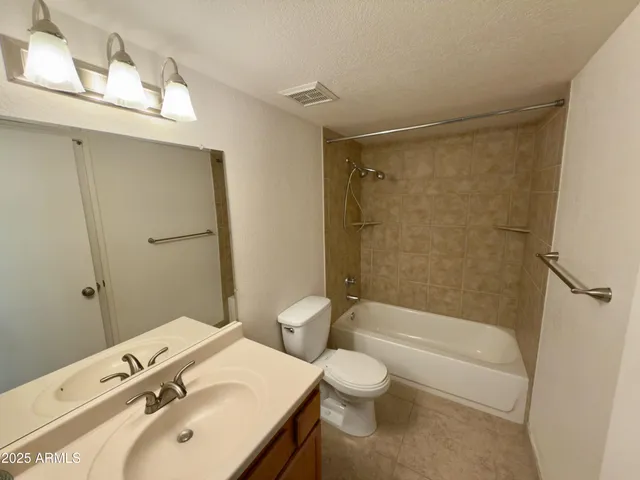 a bathroom with a bath tub