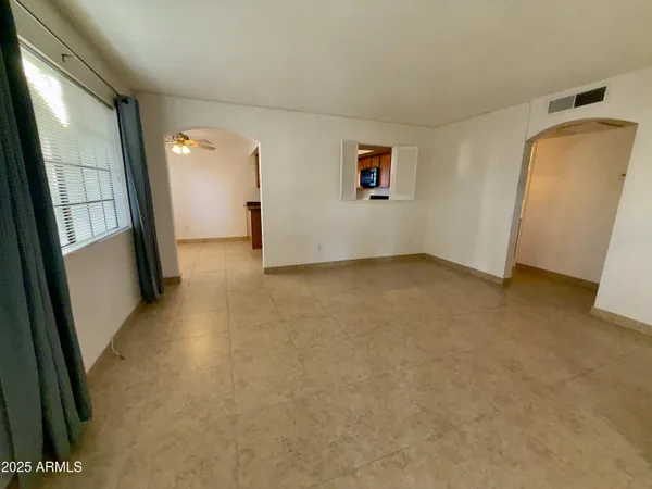 an empty room with windows