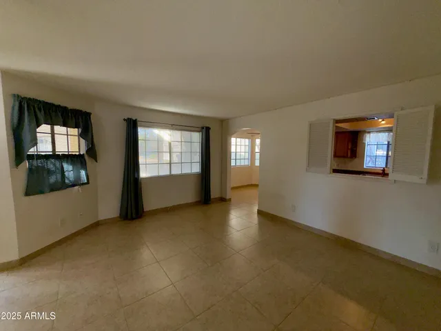 an empty room with windows